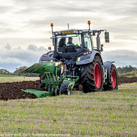 Buy canvas prints of Modern Tractor Ploughing by Rodney Hutchinson