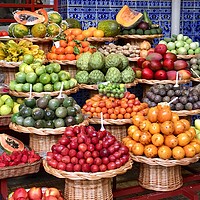 Buy canvas prints of Exotic fruits in whicker baskets by Joyce Hird
