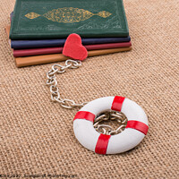 Buy canvas prints of Books attached to a life saver with a chain by Turgay Koca