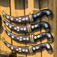 Buy canvas prints of Turkish style daggers with mother of pearl inlays by Turgay Koca