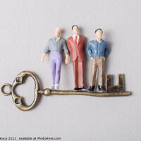 Buy canvas prints of Tiny figurine of man model and retro key by Turgay Koca