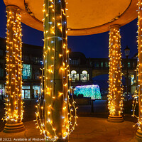 Buy canvas prints of Sparkling Festive Lights Decorating Four Pillars.  by Steve Gill