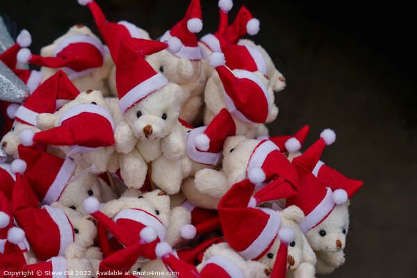 Stack of Adorable Teddy Bears Wearing Father Christmas Hats. Picture Board by Steve Gill