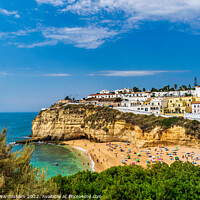 Buy canvas prints of Serene Oasis Overlooking Carvoeiro Beach by RJW Images