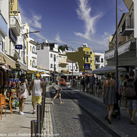 Buy canvas prints of Colourful Carvoeiro Shopping by RJW Images