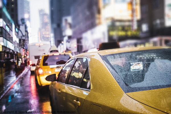 Taxi cab in the rain in NYC Picture Board by Simo Wave