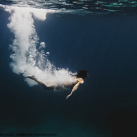 Buy canvas prints of Woman diving underwater by Simo Wave