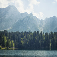 Buy canvas prints of Coniferous and Alpine lake by Simo Wave