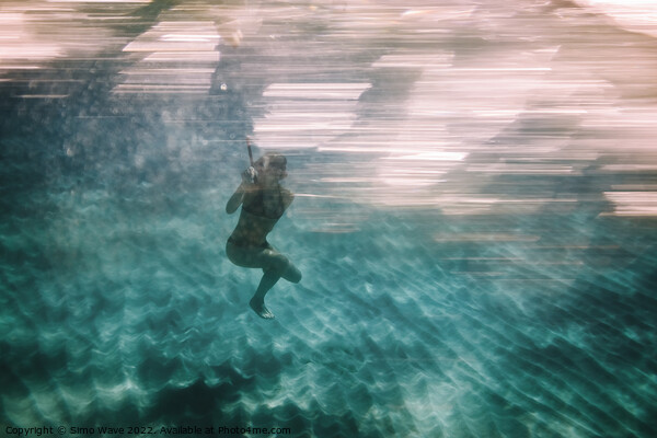 Woman diving underwater for snorkeling Picture Board by Simo Wave