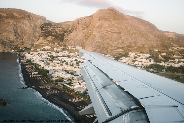 Airplane is landing in Santorini Island Picture Board by Simo Wave