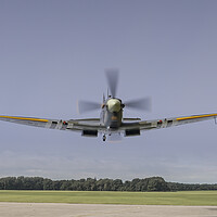 Buy canvas prints of Spitfire, low level flypast by Simon Westwood