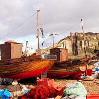 Buy canvas prints of Clinker built fishing boats on Hastings Beach by Sally Wallis