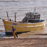 Buy canvas prints of Beaching a Hastings fishing boat by Sally Wallis