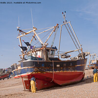 Buy canvas prints of working boat just beached by Sally Wallis