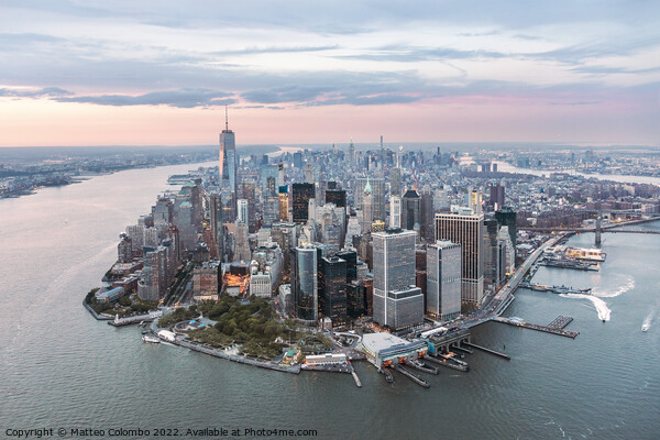 Aerial of lower Manhattan peninsula at sunset, New York, USA Picture Board by Matteo Colombo