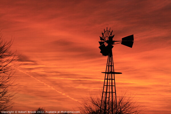 Kansas Sunset with red sky and a Windmill silhouet Picture Board by Robert Brozek