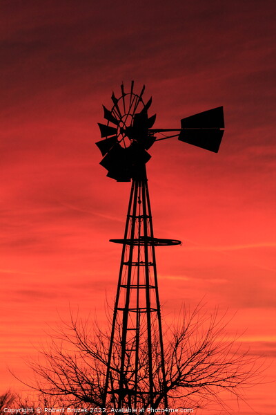 Kansas Sunset with a red Sky and Windmill silhouet Picture Board by Robert Brozek