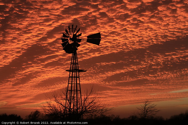 Kansas Sunset with a colorful sky and Windmill  Picture Board by Robert Brozek