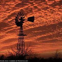 Buy canvas prints of Kansas Sunset with a colorful sky and Windmill  by Robert Brozek