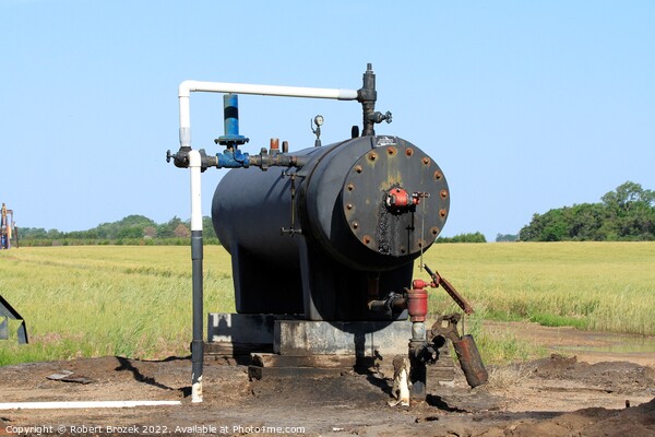 Oil Well Storage Equipment in a field Picture Board by Robert Brozek