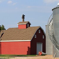 Buy canvas prints of Red Barn with blue sky by Robert Brozek