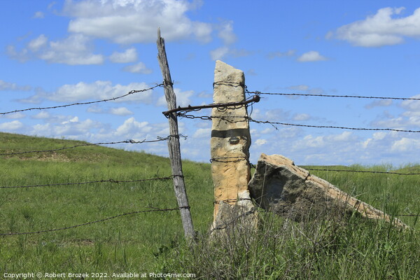 Outdoor stone post fence with grass Picture Board by Robert Brozek