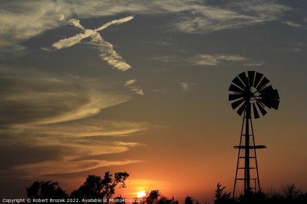 sunset with windmill and sky with cross Picture Board by Robert Brozek