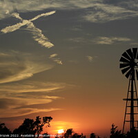 Buy canvas prints of sunset with windmill and sky with cross by Robert Brozek
