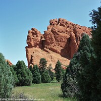 Buy canvas prints of Colorado Garden of the Gods with Mountain,  by Robert Brozek