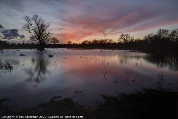 Sunset with flooded fields at Esling Norfolk UK Picture Board by Paul Stearman