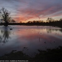 Buy canvas prints of Sunset with flooded fields at Esling Norfolk UK by Paul Stearman