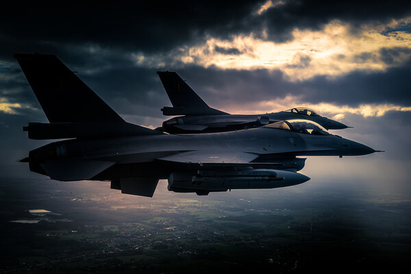 A fighter jet F-16 breaking away in a special light Picture Board by Bart Rosselle