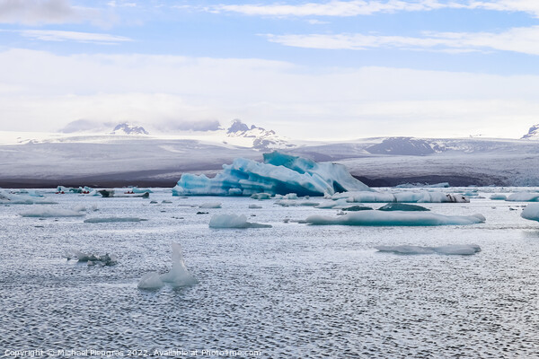 Iceland, Jokulsarlon Lagoon, Turquoise icebergs floating in Glac Picture Board by Michael Piepgras