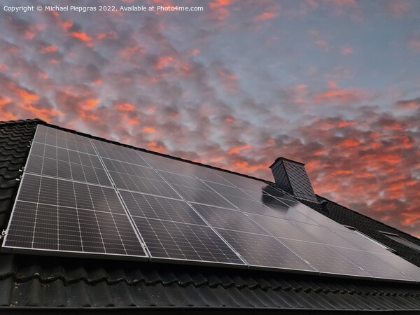 Solar panels producing clean energy on a roof of a residential h Picture Board by Michael Piepgras