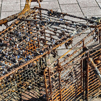 Buy canvas prints of Rusty and damaged shopping cart found in the port of Kiel in Ger by Michael Piepgras