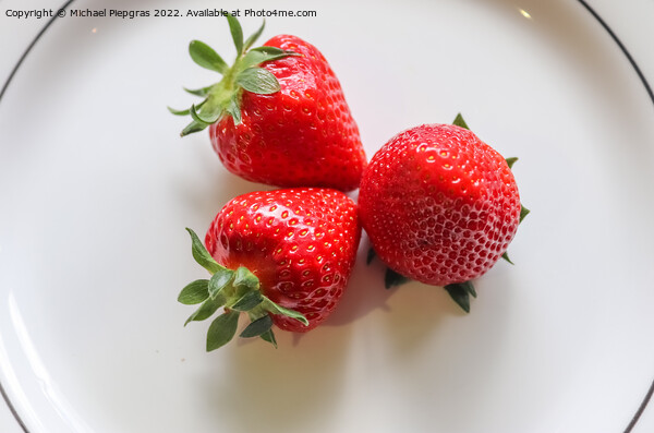 Strawberries with leaves on a plate in a glas bowl. Isolated on  Picture Board by Michael Piepgras