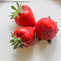 Buy canvas prints of Strawberries with leaves on a plate in a glas bowl. Isolated on  by Michael Piepgras