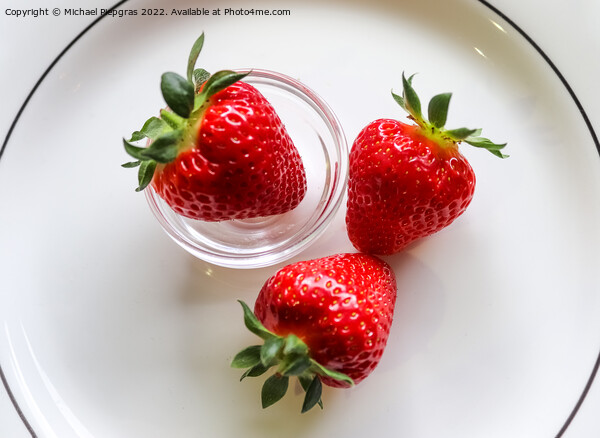 Strawberries with leaves on a plate in a glas bowl. Isolated on  Picture Board by Michael Piepgras