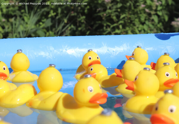 Selective focus. Many yellow rubber ducks swimming in circles in Picture Board by Michael Piepgras