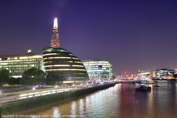 View of the London skyline at night with river thamse and lots of light Picture Board by Michael Piepgras