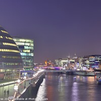 Buy canvas prints of View of the London skyline at night with river thamse and lots of light by Michael Piepgras