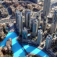 Buy canvas prints of Aerial view over the city center of dubai on a sunny day by Michael Piepgras