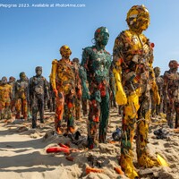 Buy canvas prints of A swarm of evil plastic waste figures conquers the beach from th by Michael Piepgras