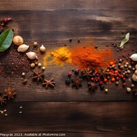 Buy canvas prints of Top view of a lot of spices on a wooden table with copy space cr by Michael Piepgras