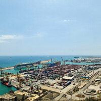 Buy canvas prints of Aerial View of the industrial port of Barcelona on a sunny summer day. by Michael Piepgras