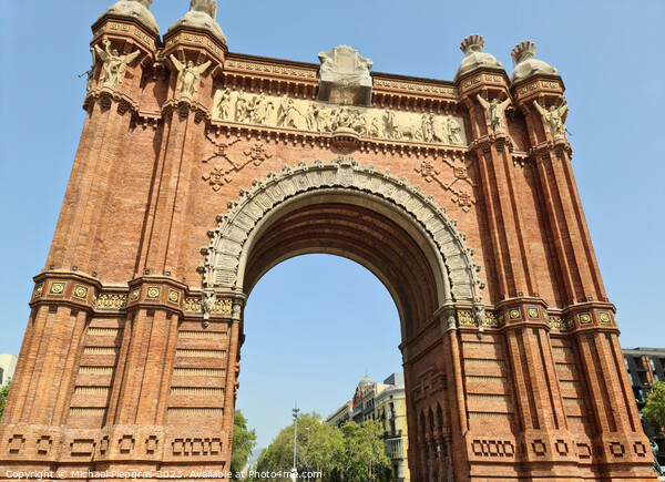 Barcelona, Spain - 22 July 2023: The Arc de Triomf in Barcelona on a sunny day with some tourists Picture Board by Michael Piepgras