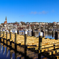 Buy canvas prints of Flensburg, Germany - 03 March 2023: View of the historic harbour by Michael Piepgras