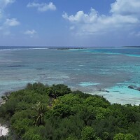 Buy canvas prints of Drone view of paradise islands of the Maldives with coral reefs  by Michael Piepgras