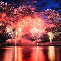 Buy canvas prints of An impressive happy new year fireworks. by Michael Piepgras