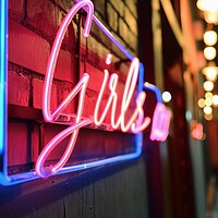 Buy canvas prints of A colorful neon sign showing the word Girls on the wall of a clu by Michael Piepgras